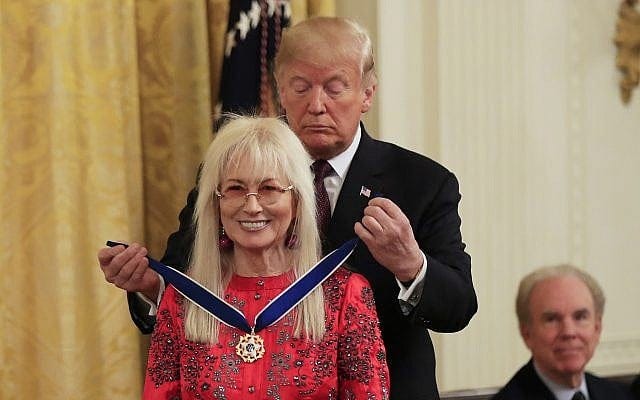 Then US President Donald Trump presents the Presidential Medal of Freedom to Miriam Adelson during a ceremony in the East Room of the White House, in Washington, November 16, 2018. (AP Photo/Manuel Balce Ceneta)