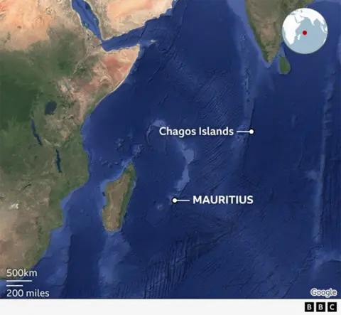 A map shows the location of the Chagos Islands in the Indian Ocean. South west of the islands is the island of Mauritius, with some on Africa shown to the west. A map shows the location of the Chagos Islands in the Indian Ocean. South west of the islands is the island of Mauritius, with some on Africa shown to the west.