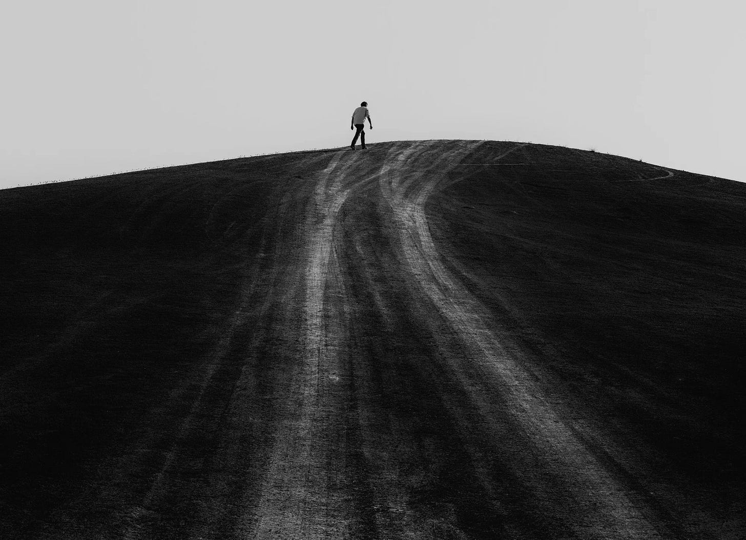A man walking up a hill