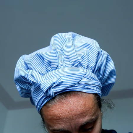 hair bonnet for sleeping on a women’s head front view, knot at the front hair bonnet for sleeping on a women’s head front view, knot at the front