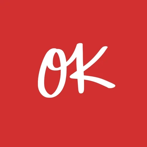 A red background with white letters that read OK A red background with white letters that read OK