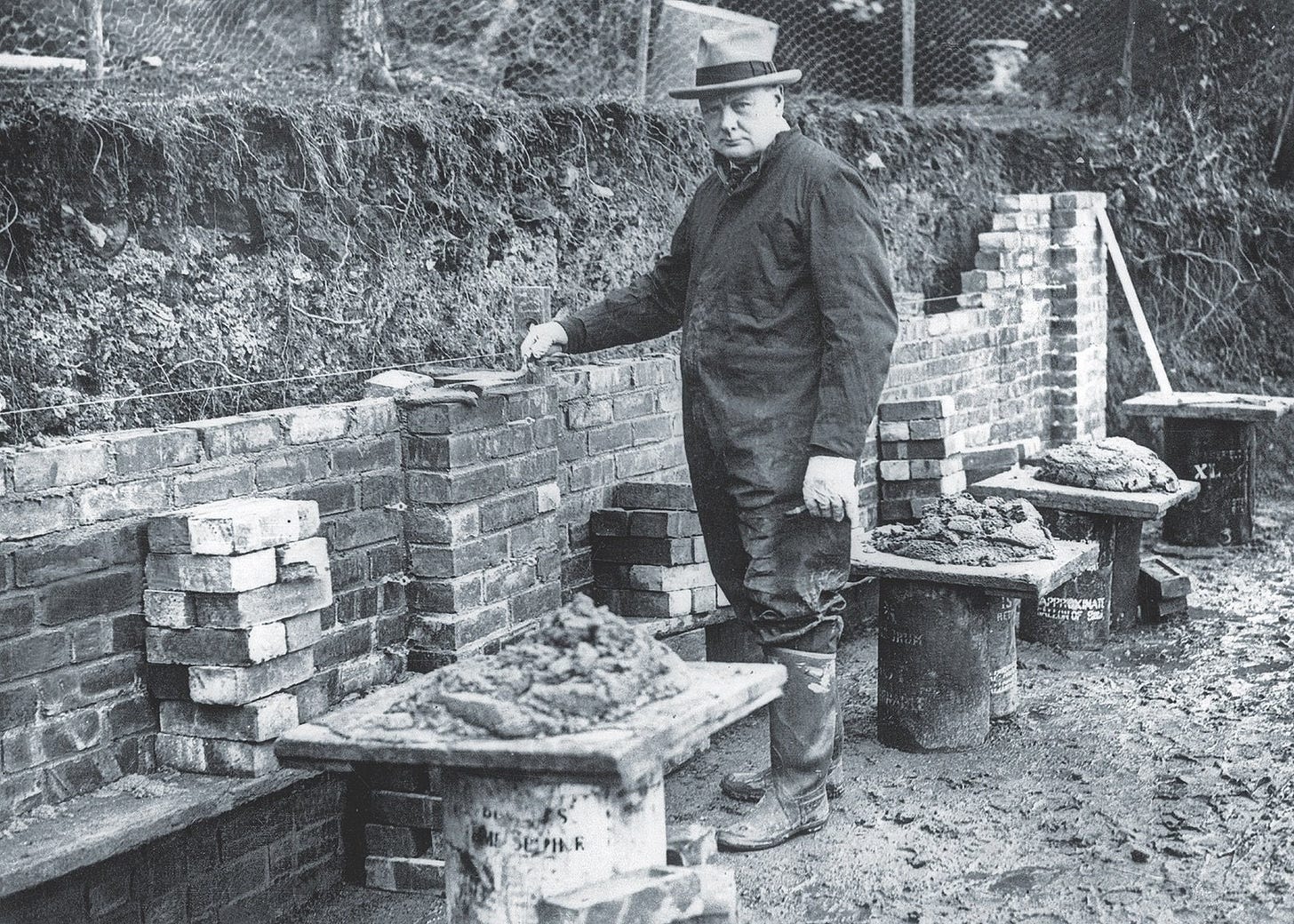 A person standing next to a brick wall
AI-generated content may be incorrect. A person standing next to a brick wall
AI-generated content may be incorrect.