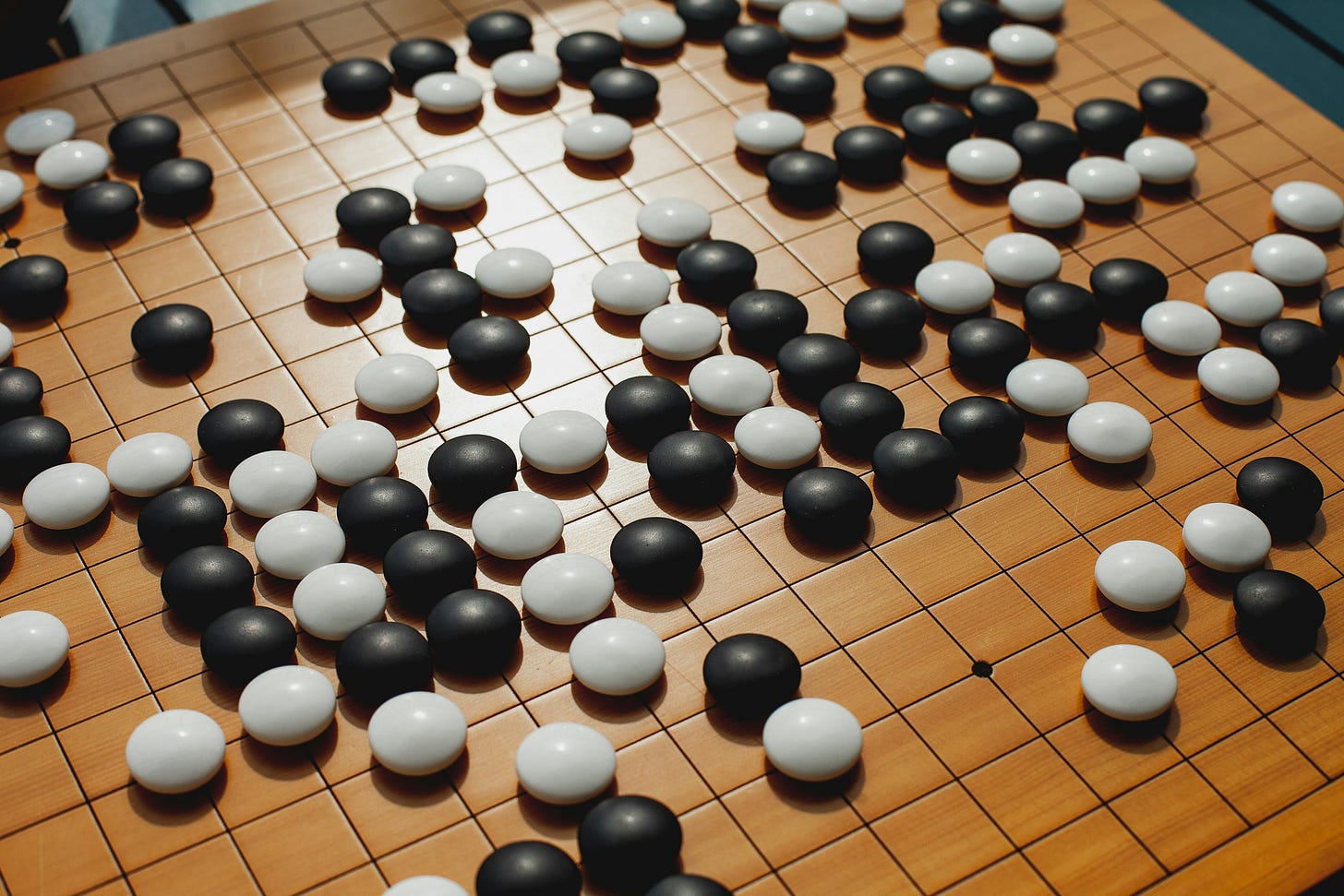 Picture from Elena Popova on Unsplash with the Go game Picture from Elena Popova on Unsplash with the Go game