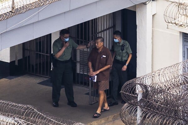 Jimmy Lai walks through the Stanley prison in Hong Kong, Friday, July 28, 2023. The Associated Press got a rare glimpse of the jailed 75-year-old publisher and prominent pro-democracy activist Lai. (AP Photo/Louise Delmotte)