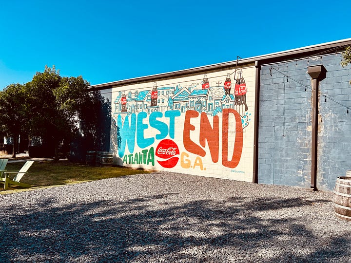 signs, lights, tables, chairs, sky