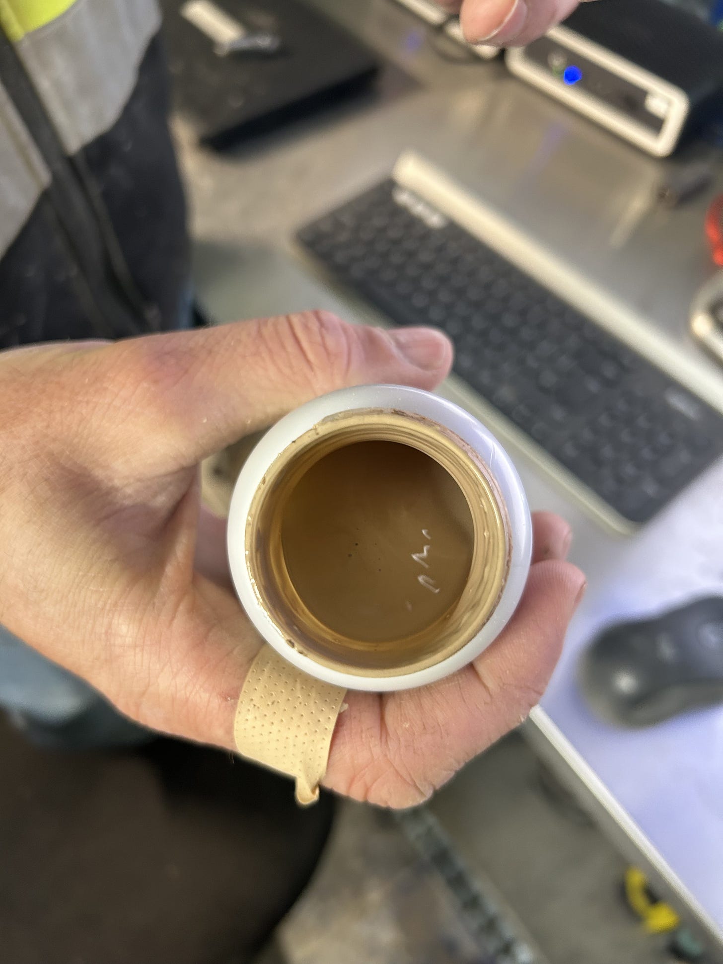 The heavy fluid — like potter's clay slip