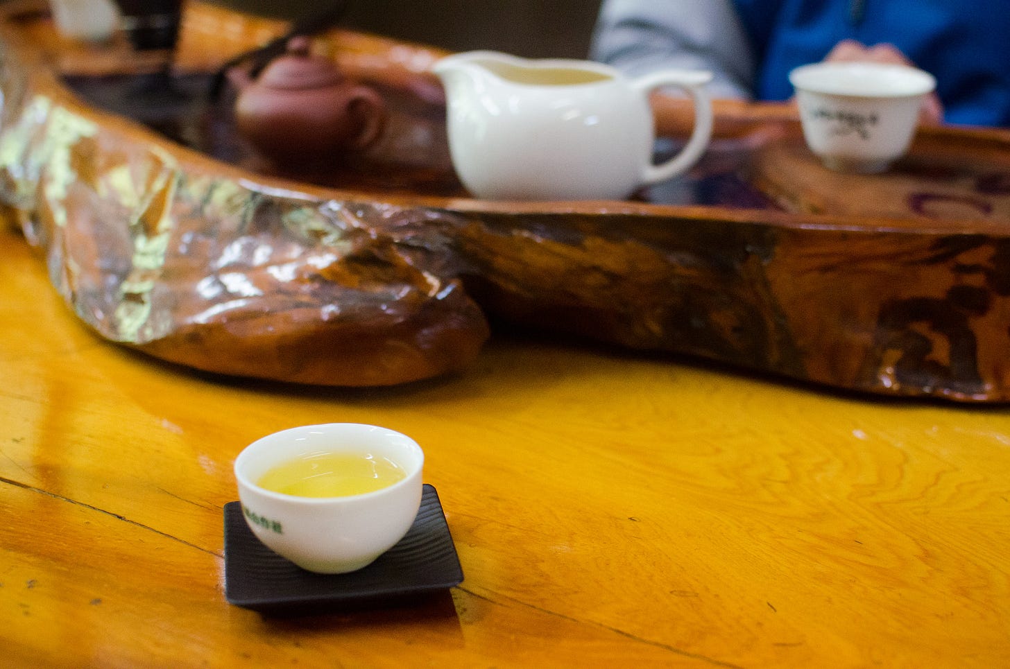 ID: Small cup of oolong tea on table