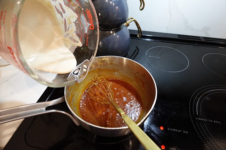 Watching the sugar melt before stirring in cream, butter, tahini, rose water, and a sprinkle of flaky sea salt.
