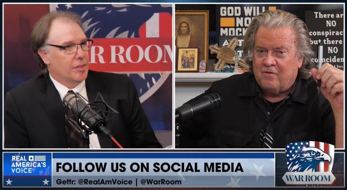 Two men discussing on a podcast set, featuring microphones and various decorations, emphasizing social media engagement for the show "War Room." Two men discussing on a podcast set, featuring microphones and various decorations, emphasizing social media engagement for the show "War Room."