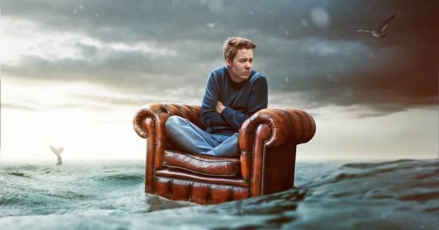 A person sitting in a chair in water

AI-generated content may be incorrect.