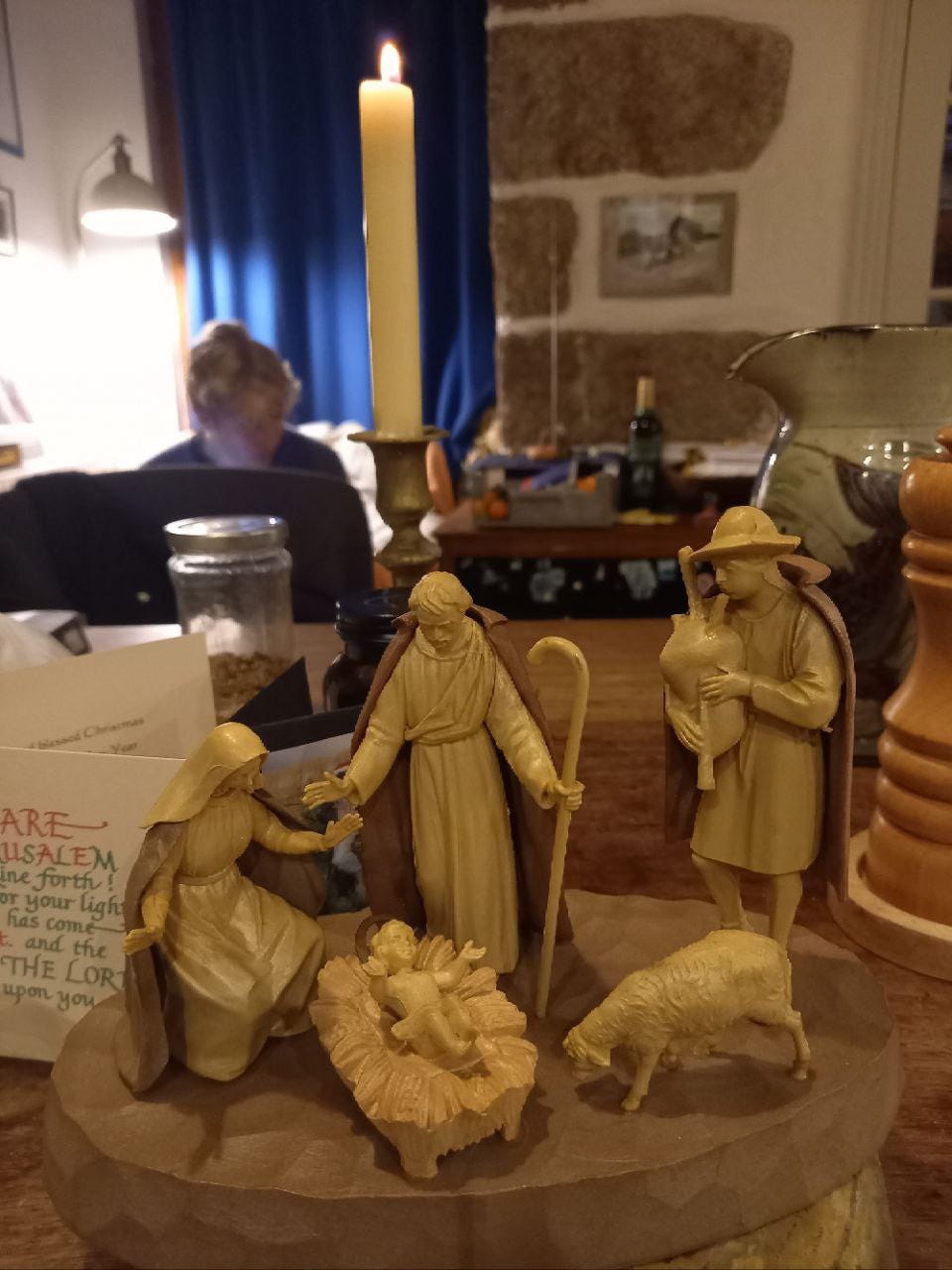 A group of figurines on a table

Description automatically generated