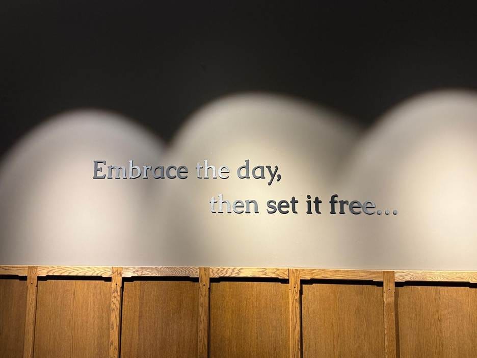 A wall with words on it

AI-generated content may be incorrect.