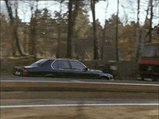 moving gif of car colliding with motorcycle before crashing into an auto transport trailer and launching into the air moving gif of car colliding with motorcycle before crashing into an auto transport trailer and launching into the air