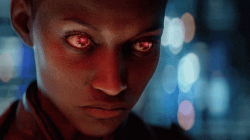 a close up of a person 's face with glowing red eyes