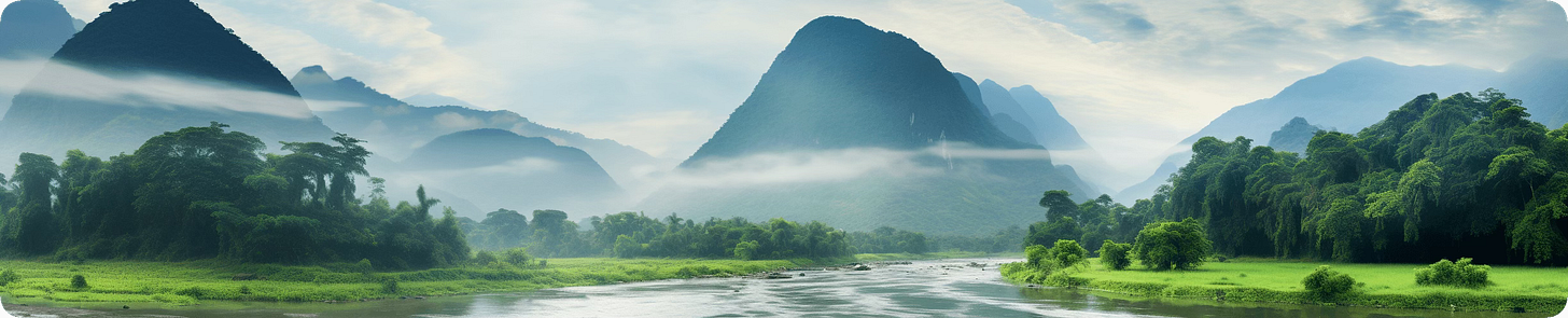 Green Lao valley with the Mekong river, mist-covered mountains, and dense forests.