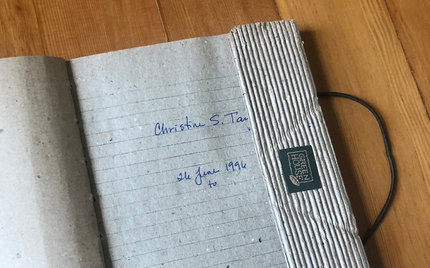 Kraft paper journal open to first page