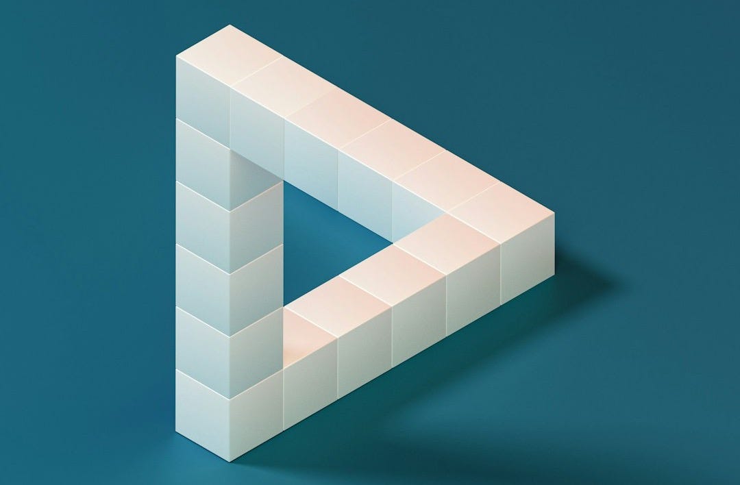 a white object on a blue background with a shadow