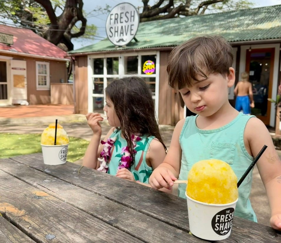 Natural shave ice with a mustache straw from The Fresh Shave in Old Koloa Town, Kauai.