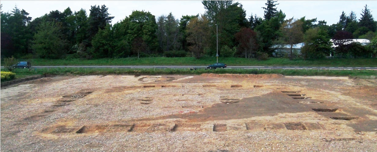 Photo showing the archaeological excavation of the large Pictish square barrow at Greshop, near Forres. The early medieval route likely passed by here, just as the A96 in the background does today Photo showing the archaeological excavation of the large Pictish square barrow at Greshop, near Forres. The early medieval route likely passed by here, just as the A96 in the background does today
