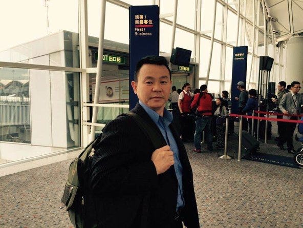 Xiong Yan on Thursday at the Hong Kong International Airport, where immigration officials prevented him from entering the territory.