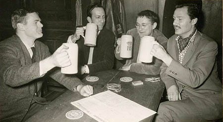 Debord (second from left) at different dinner, long ago.