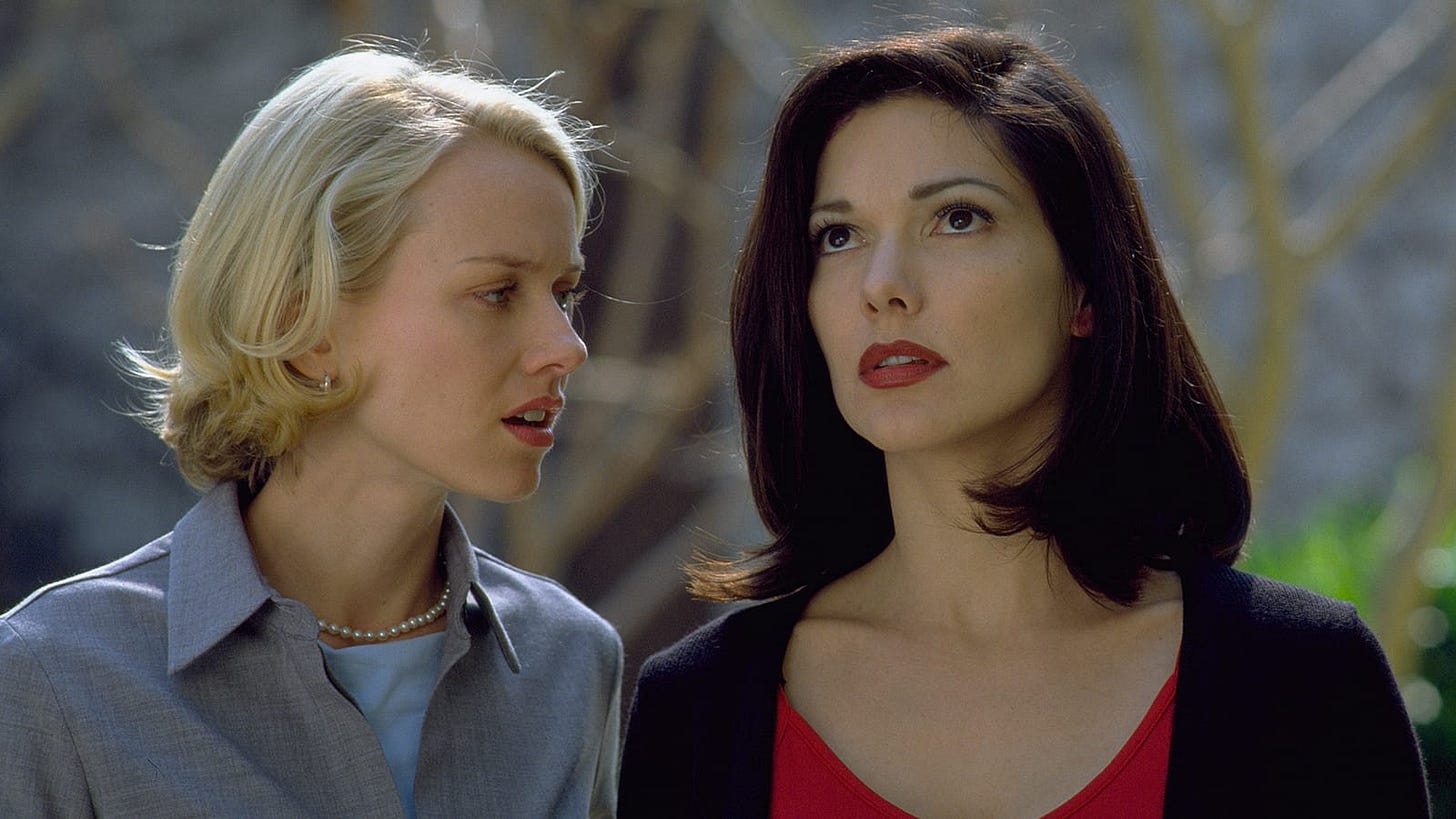 Mulholland Drive | Still features Naomi Watts and Laura Elena Harring, the latter looking upward.