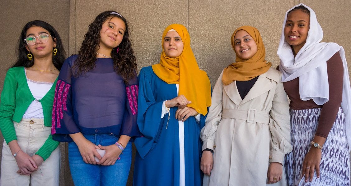 A group photo of members of the Wa'ed network for adolescent girls