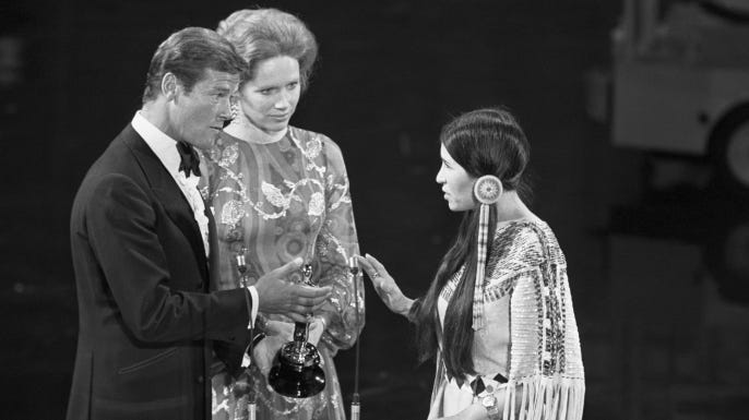 marlon brando rejects oscar for godfather because of native americans with roger moore marlon brando rejects oscar for godfather because of native americans with roger moore