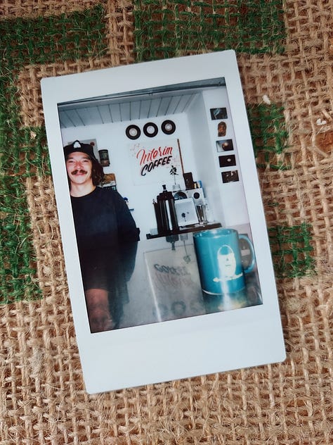 Instant photographs of coffee mugs.