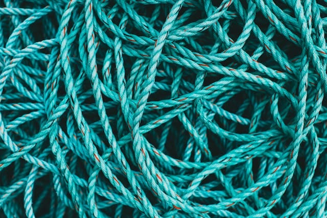 Somewhat tangled blue nylon rope