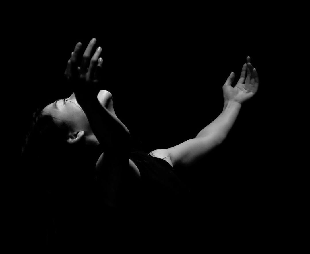 grayscale photo of woman in black dress