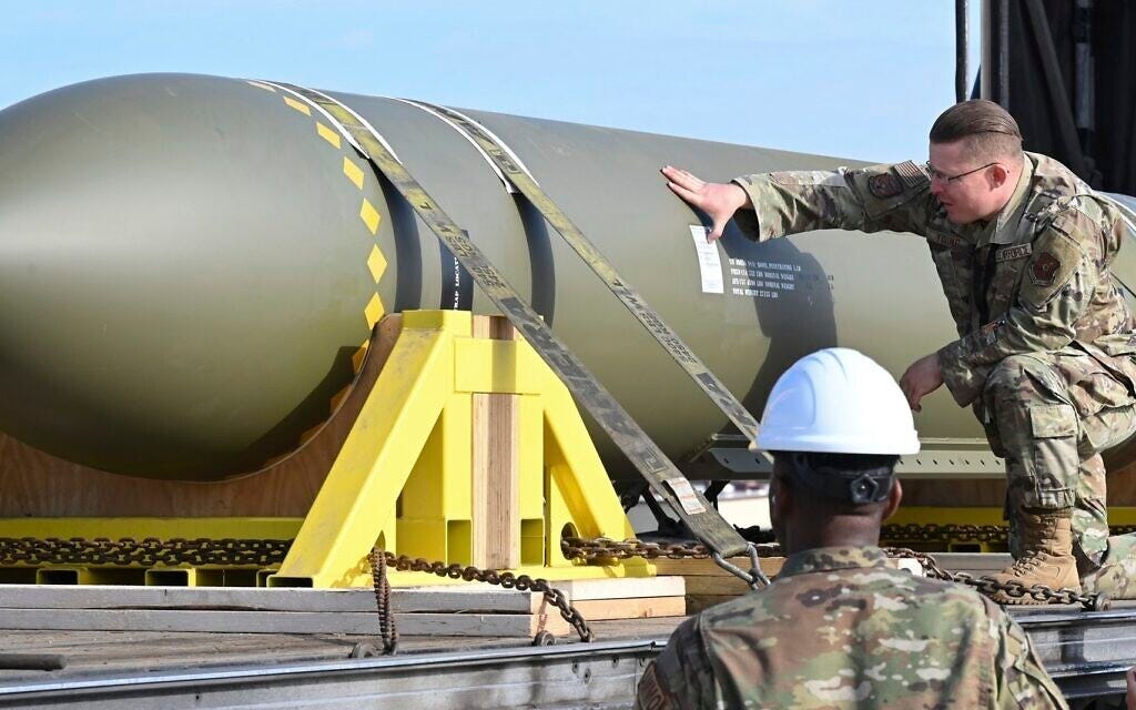 In this photo released by the US Air Force on May 2, 2023, airmen look at a GBU-57, or the Massive Ordnance Penetrator bomb, at Whiteman Air Base in Missouri (US Air Force via AP) In this photo released by the US Air Force on May 2, 2023, airmen look at a GBU-57, or the Massive Ordnance Penetrator bomb, at Whiteman Air Base in Missouri (US Air Force via AP)