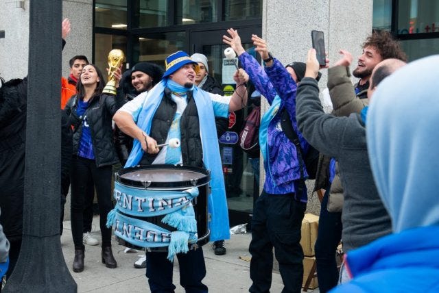 Argentina fans in Toronto celebrating after winning the World Cup finals on St Clair Avenue West