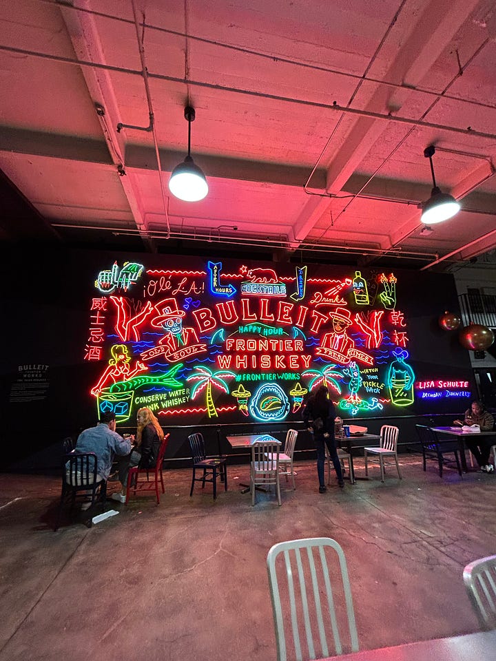 photos of the neon signs at GCM
