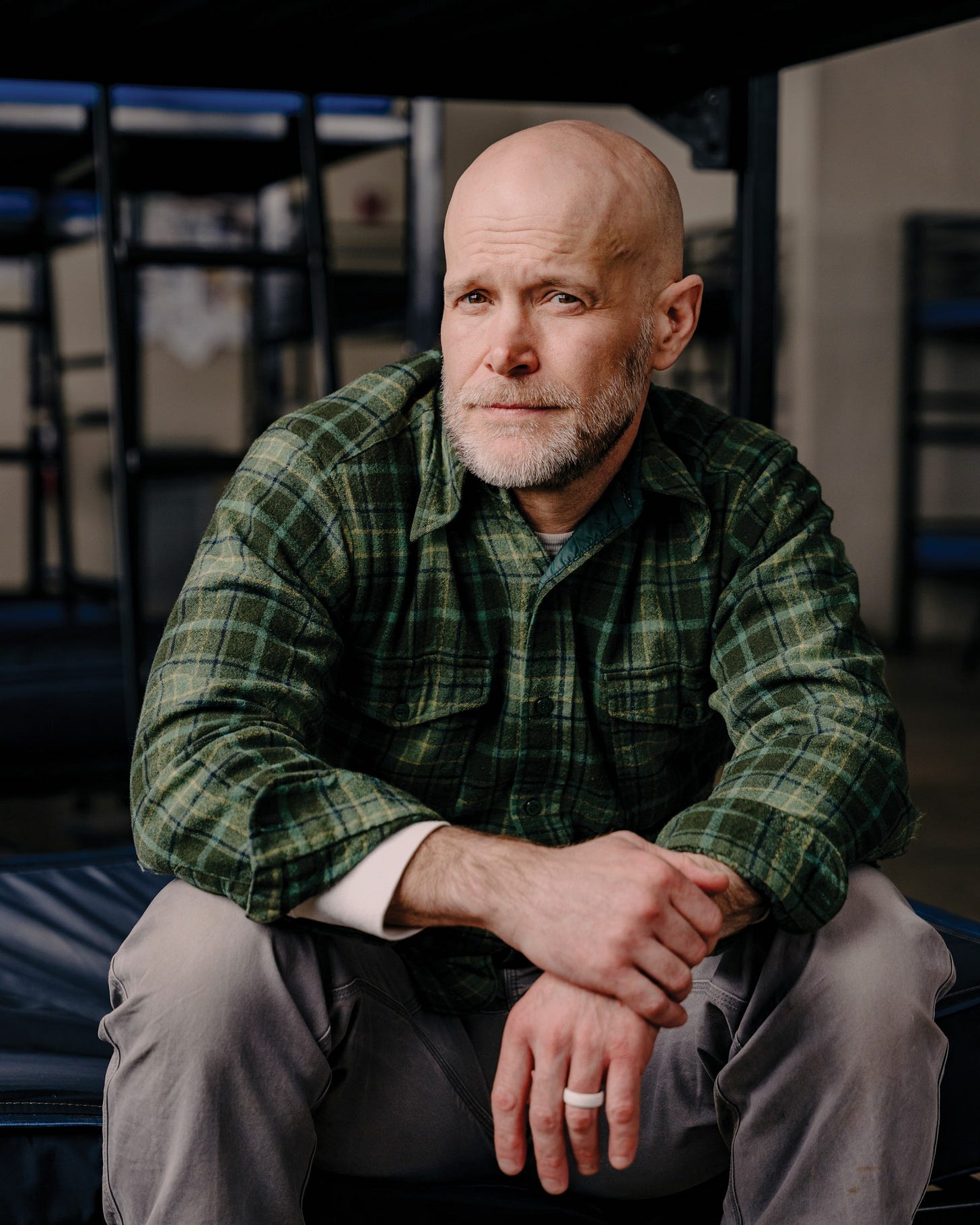 Brian Guyer, HRDC housing director, on a bunk at the Warming Center. Brian Guyer, HRDC housing director, on a bunk at the Warming Center.