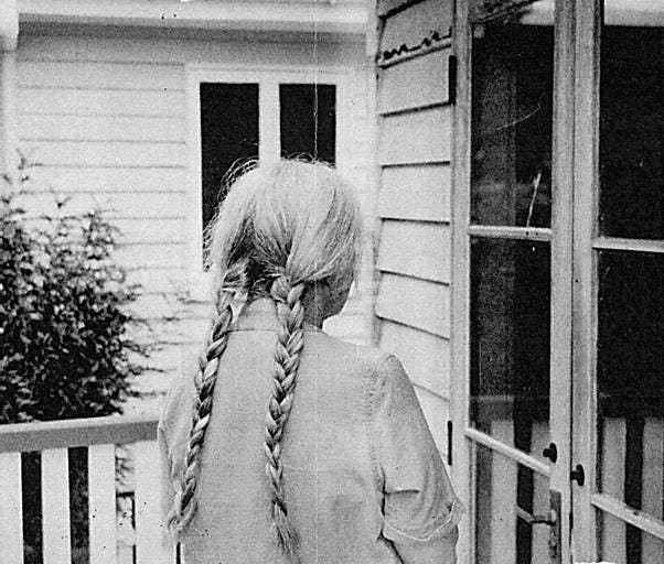 A person with braided hair

AI-generated content may be incorrect.