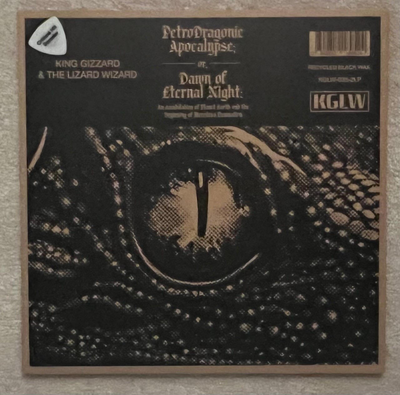 Outer sleeve for Petrodragonic Apocalypse by King Gizzard and the Lizard Wizard showing the close up of a dragon eye. 