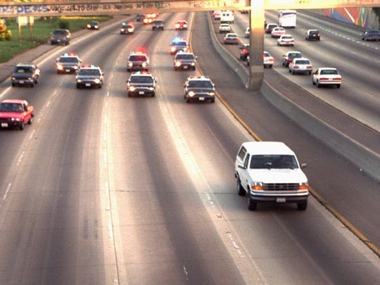 A white Ford Bronco, driven by Al Cowlings and carrying
