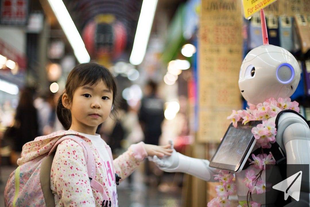 photo of girl laying left hand on white digital robot
