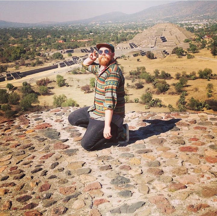 A sassy gay poses in front of the Pyramid of the Moon at the ruins Teotihoucan. The glimmering Museo Soumaya in Polanco