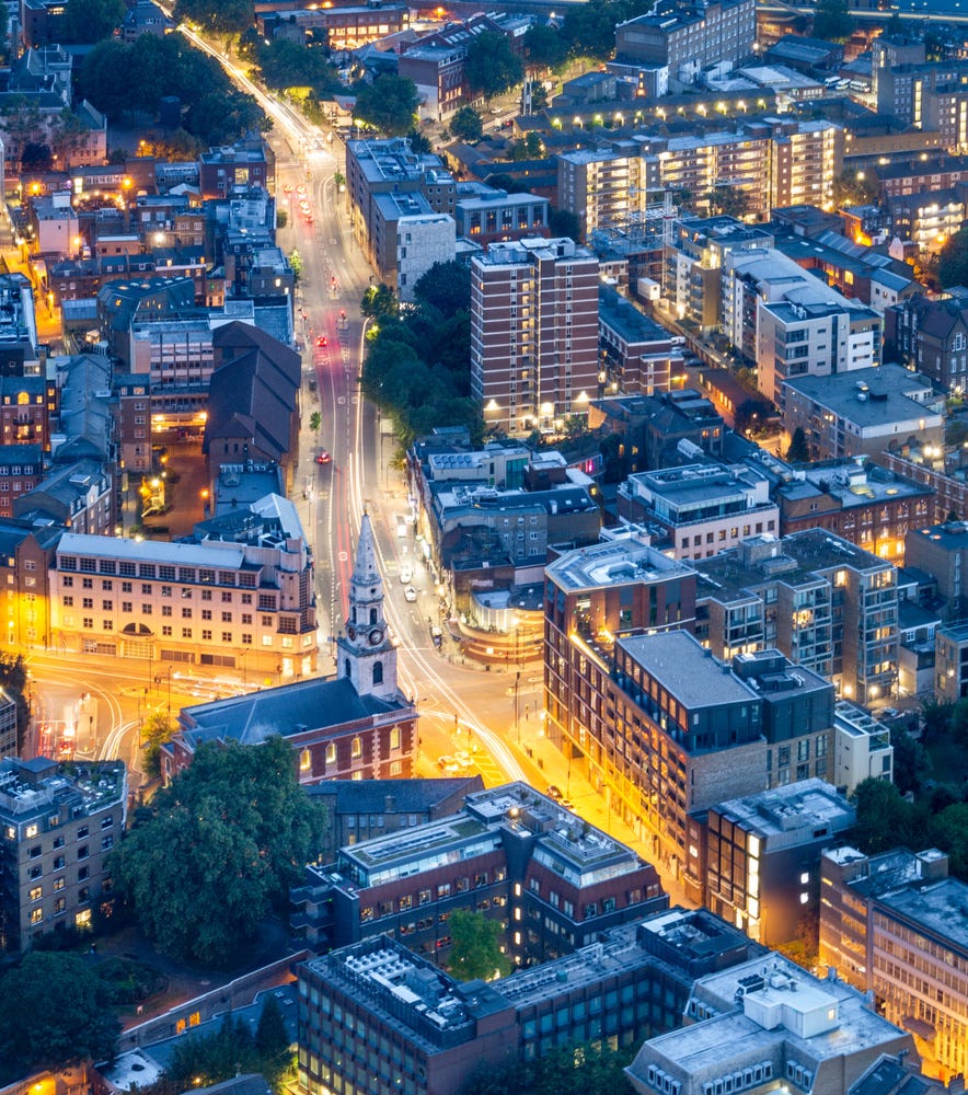 May be an image of skyscraper and twilight