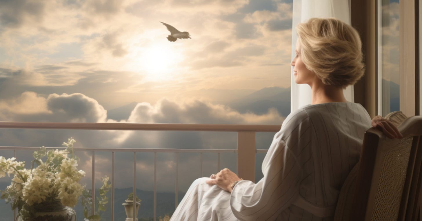 A woman in a white cotton gown sits on a balcony at eye level with the clouds and partially setting sun. Her eyes are closed in meditation as a bird flies nearby. White flowers in a vase adorn the balcony.