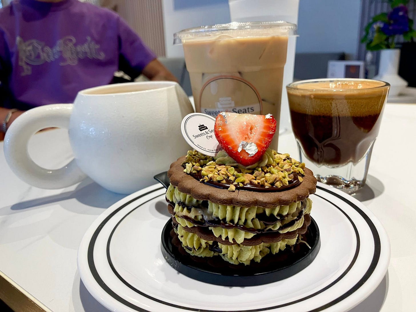 May be an image of 1 person and cake