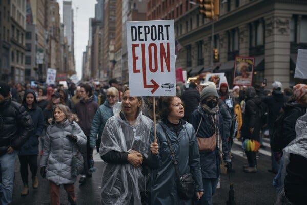 Demonstrators march during a "Hands Off!" protest against President Donald Trump on Saturday, April 5, 2025, in New York. (AP Photo/Andres Kudacki)