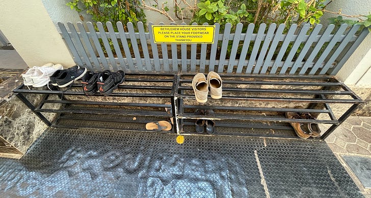 Men stow their shoes in a rack on one side of the parish adoration chapel, and women use a rack on the other side of the door. Credit: JD Flynn/Pillar Media.