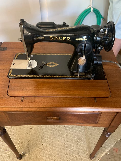 3 sewing machines from different eras