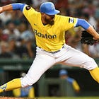 John Schreiber reports to Red Sox camp early, equipped with new pitch 