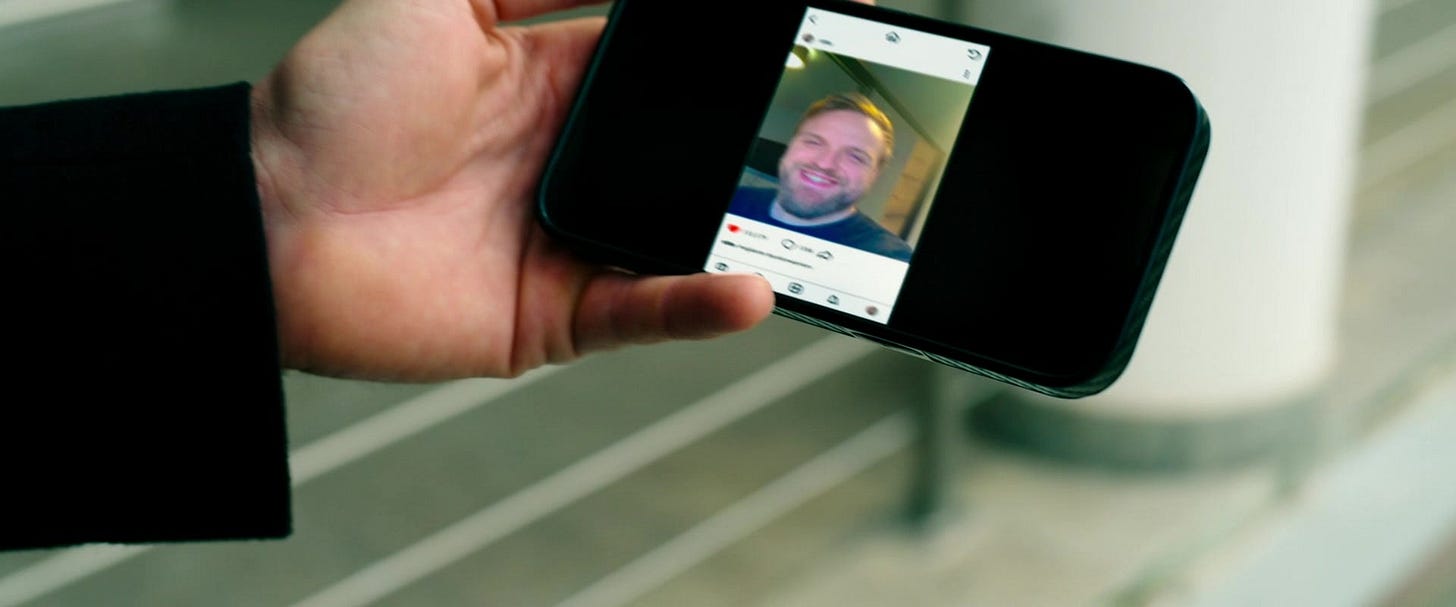 Citizen Vigilante | Still features a vertical video displayed on a phone held horizontally. Citizen Vigilante | Still features a vertical video displayed on a phone held horizontally.