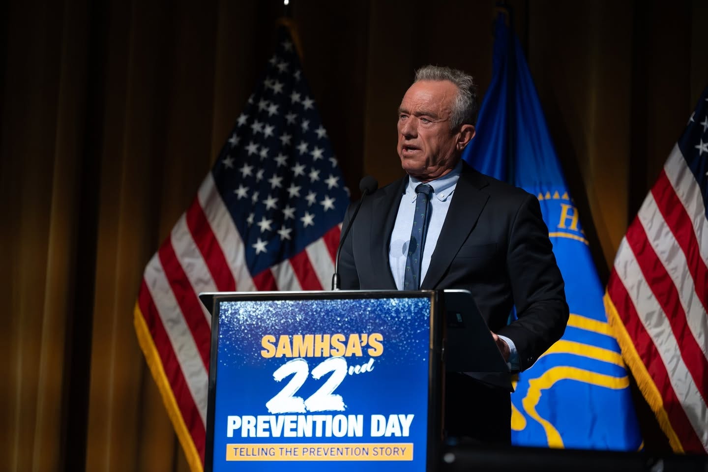This image captures Robert F. Kennedy Jr. speaking at the Substance Abuse and Mental Health Services Administration's (SAMHSA) 22nd Prevention Day event. 