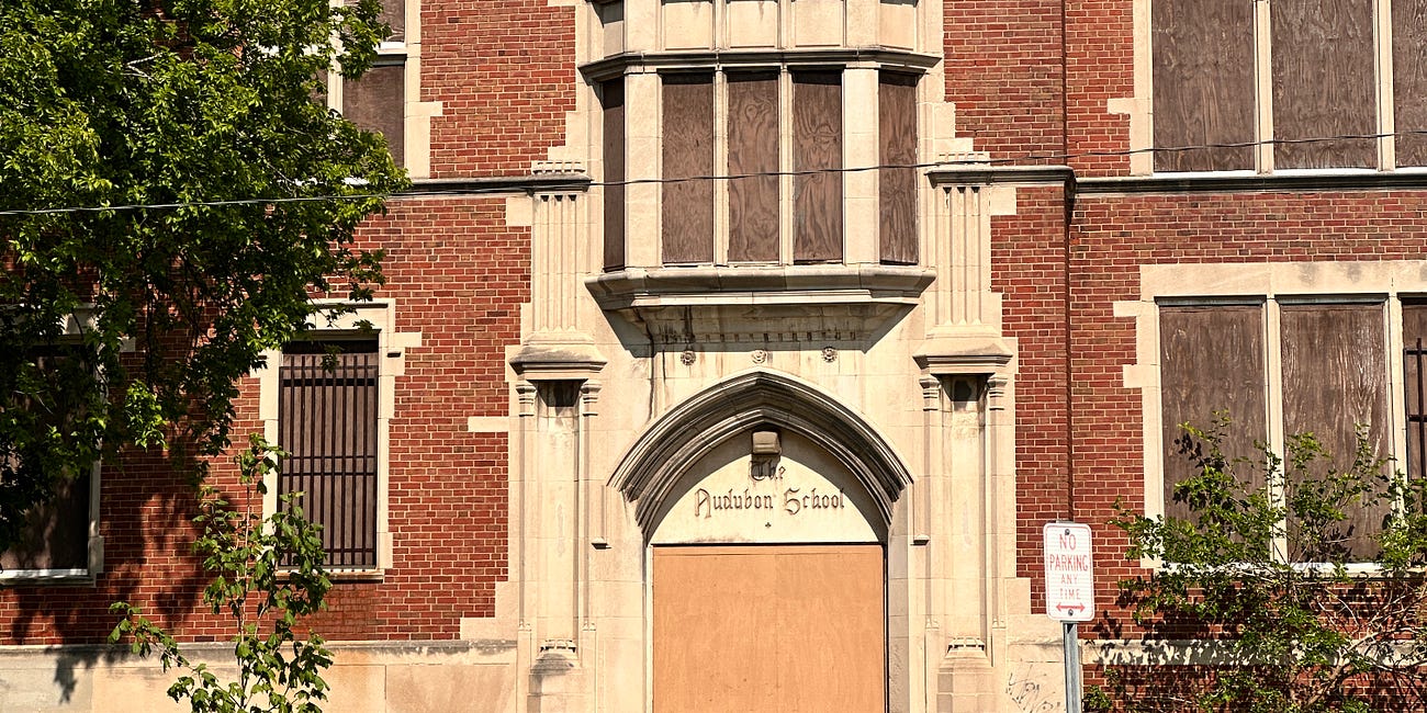 The Name Is Still Carved Over the Door